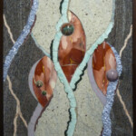 Ribbons<br>
22" x 29", 2012 <br>
Granite, gneiss, mookite, aragonite, lepidolite, adventurine, marble; spheres of orbicular jasper, lepidolite; tumbled blue lace agate A painting of fish and rocks on the wall.