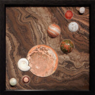 Earth Sampler I: Palmwood & Ammonite <br>
13" x 13", 2014 <br>
Marble, spheres of horn coral, ocean jasper, banded calcite, unakite, zebra stone, prehnite; quartz crystal, palm wood, ammonite A picture of the solar system in a frame.