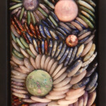 Pebbles II: Intertwined<br>
7" x 10.4", 2015<br>
Spheres of charoite, rhodochrosite, mookaite, and fuchsite with rubies; <br>
Aventurine, amethyst, green quartz, rose quartz, red tiger’s eye, lapis lazuli, sodalite, mookaite A close up of a cell phone with many different colored shells