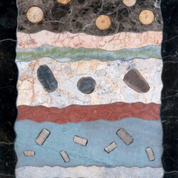 A painting of rocks and stones on the ground.