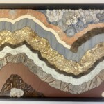 . Beyond Revisited<br>
18.50”x 26” 2024 <br>
Marble, limestone, dumortiorite quartzite, magnesite, slate, jasper
Azurite concretions, quartz drusy, gypsum rosettes, chalcedony concretions, botryoidal calcite A painting of mountains and rocks with gold, brown, white and blue.