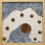 Moons over Jasper Mountain <br>
13" x 13", 2003 <br>
Travertine, granite, tiger's eye spheres, jasper, druzy quartz with fluorite A picture of some rocks and stones with holes in them.