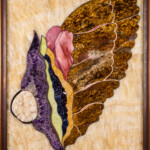 Wings VI: Wing on the Wind <br>
19.75” x 25”, 2018 <br>
Honey onyx, gold grunerite, mookaite, serpentine, sodalite, amethyst, marble; <br>
Minerals: amethyst drusy, apophyllite on stilbite from Maharashtra, India A picture of a leaf with different colors.