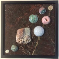 Earth Sampler Series XXIII: Botryoidal Drusy <br>13" x 13", 2017<br>
Marble; botryoidal drusy quartz; concretion, blue calcite, ruby in zoisite, rhodochrosite, jade, stalactite A picture of some rocks and marbles on the ground.