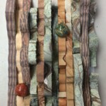 Waves III: Spring in the Desert <br>
5.5” x 9”, 2018 <br>
Printstone (siliceous siltstone), travertine, limestone, sandstone, mookaite, mahogany obsidian cabochon A piece of paper art with some wood and other materials