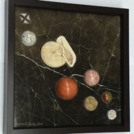Earth Sampler Series VII: Ammonite and Fish <br> 13” x 13”, 2014 <br> Marble; White ammonite; Fish from the Green River Fm, Wy; spheres of mookaite, sunstone, jasper, orbicular jasper; crystals of gypsum, citrine, staurolite A painting of planets and asteroids on a black background.