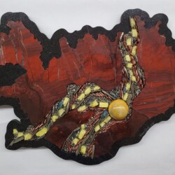 A painting of a snake on a leaf.