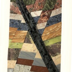 A picture of a quilt with the image of a train tracks.